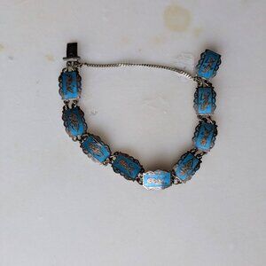 Siam Bracelet with Blue Background 9 Dancers